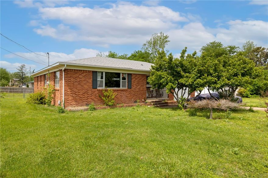 Located in the heart of downtown Bentonville, this property sits on a.16 acre corner lot, offering endless potential. The home features three spacious bedrooms, along with a generous living and dining area that’s perfect for gathering and entertaining. Large windows throughout fill the space with abundant natural light, creating a warm and inviting atmosphere. Additional .15 parcel to the west is also available for sale.

Whether you're an investor, builder, or buyer with vision, this property presents an exceptional opportunity. Renovate and update the existing home, expand to create your dream residence.