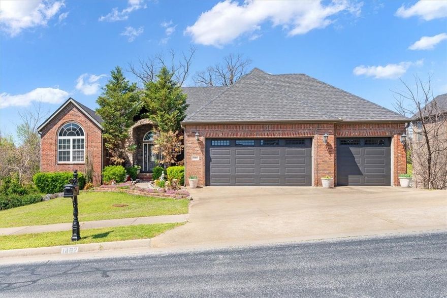 Welcome to this stunning home less than 7 minutes from the new Walmart Campus, Crystal Bridges & Walton Health center, bike trails & Bentonville Square. As they say Location Location Location with a listing price well below the recent appraisal.  High ceilings, large windows, &  beautiful wood flooring are throughout the main level. An updated kitchen with new granite counters, large island & Kitchen Aid Appliances accentuate this home with 6 bedrooms & 5 baths, on 3 levels with a kitchen, living/flex space, bedrooms & baths on each floor that make up the 5,654 square feet. A theater Room, Walk in Sauna, 3 levels of covered deck for outdoor entertaining, an Outdoor Hot Tub along with unbelievable storage complete this one of a kind home. Kensington Subdivision is known as a friendly neighborhood with upscale homes, manicured yards & quiet surroundings. Enjoy a private backyard view while enjoying some occasional wildlife from your decks yet so close to I-49 !  You cannot beat this prime location anywhere in NWA.