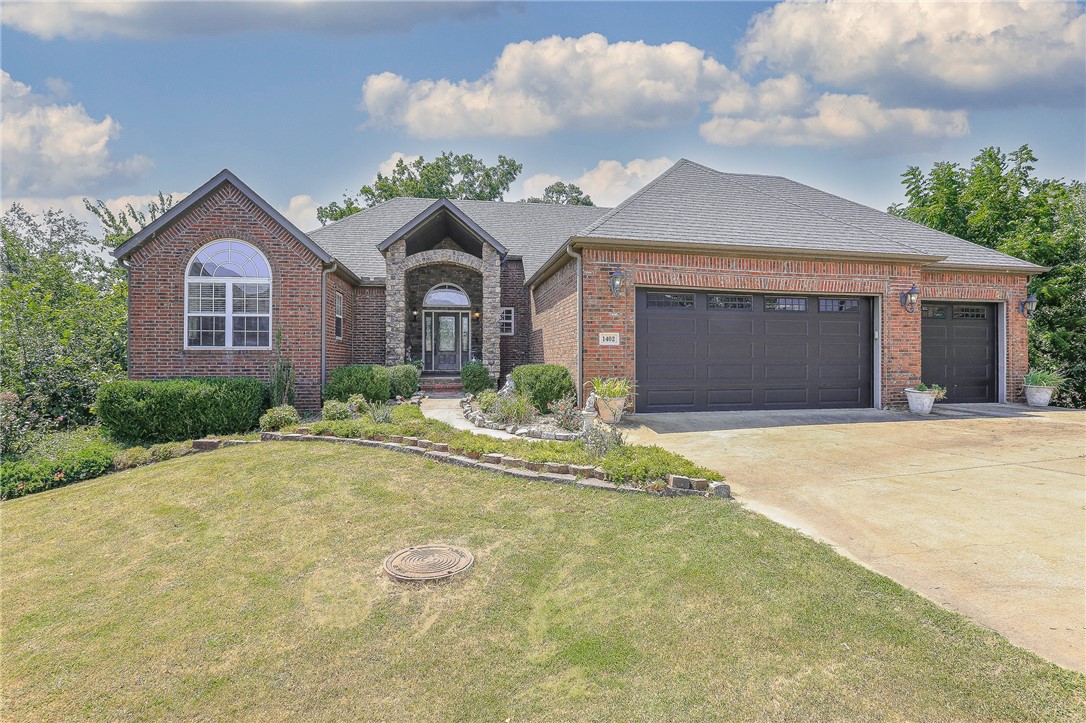 Seller is offering $25K in concessions with acceptable offer! Apply toward closing costs, or a rate buy-down to lower your monthly payment. Additional $5K in lender credits available from Preferred Lender. This stunning home is less than 7 minutes from the new Walmart Campus, Crystal Bridges & Walton Health center, bike trails & Bentonville Square. Gain instant equity with a new price $60K below recent appraisal. High ceilings, large windows, & beautiful wood flooring throughout the main level. Updated kitchen w/ new granite counters, large island & Kitchen Aid Appliances accentuate this home w/ 6 bedrooms & 5 baths, on 3 levels w/ a kitchen, living/flex space, bedrooms & baths on each floor. A theater Room, Walk in Sauna, 3 levels of covered deck & an Outdoor Hot Tub make this a one of a kind home. Kensington Subdivision is known for its upscale homes, manicured yards & quiet surroundings while being so close to I-49 You can't beat a home priced like this in such a prime location anywhere in NWA.