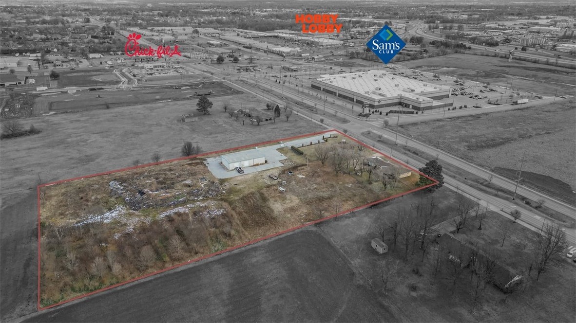 Don't miss out on this amazing C-5 zoned commercial property, on 2 parcels totaling
+/- 5 acres ,in the quickly growing Springdale care corridor. comes with 2200 sqft office space on .90 acre
(vacant) & 3000 sqft warehouse on 4.10 acres lot and has Gene George Blvd Road frontage. Conveniently located next to Sam's Club, Arkansas Children Hospital, Arvest Ballpark, Arkansas Blue Cross Blue Shield, NWACC, Highlands Oncology, future development of 115,000 Sf, two story building
of UAMS Center for Orthopedics and sports medicine. Easy access to I-49 and located in the middle of Bentonville and Fayetteville.
Owner will subdivide. This property is being valued as Commercial.