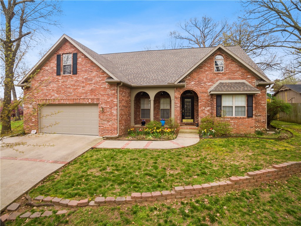 Enjoy having family or friends while still maintaining your privacy, in this beautiful and spacious 3,280 SF open & split-floor plan home. Home features lots of recessed and natural lighting, high ceilings, wood, tile and carpet flooring, built-ins and more! Boasts of 2 living areas with fireplace, formal dining, eat-in kitchen with custom white cabinetry and ample storage space, granite counters, island, large pantry, office with french glass style doors has closet and could be used as 4th bedroom plus bonus room upstairs. Exterior boasts of wood-privacy fenced backyard, 16' x 11' outbuilding with electricity would make a great hobby or workshop, 2 glass enclosed patios, and large backyard patio. Great location off of Thompson St and Lakeview and near Springdale Country Club and Lake Fayetteville with quick access to Don Tyson Pkwy, Hwy 71B, stores, businesses and more!