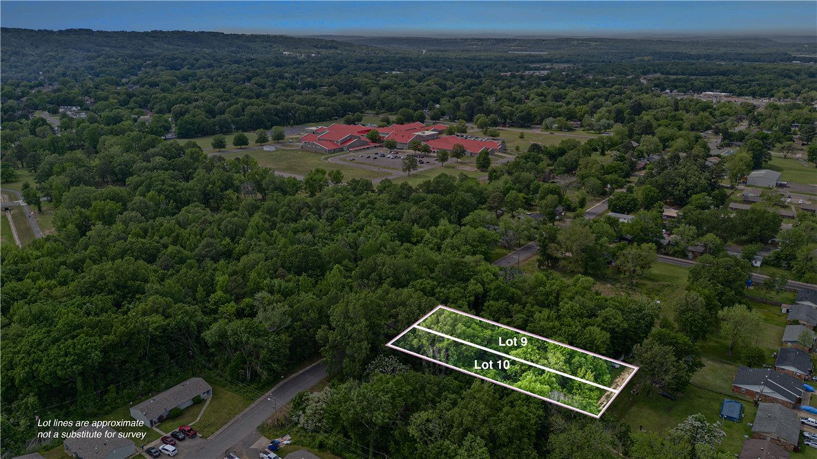 Wooded residential lots for sale on S. Independence in Russellville--Perfect for your future home or investment. Utilities are already at the road, making building easy. Don't miss this opportunity to own land in a peaceful, convenient location.