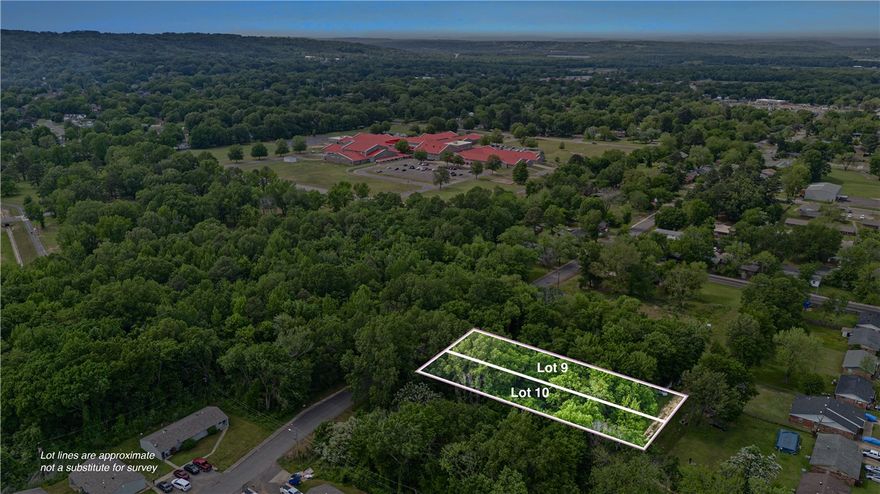 Wooded residential lots for sale on S. Independence in Russellville--Perfect for your future home or investment. Utilities are already at the road, making building easy. Don't miss this opportunity to own land in a peaceful, convenient location.