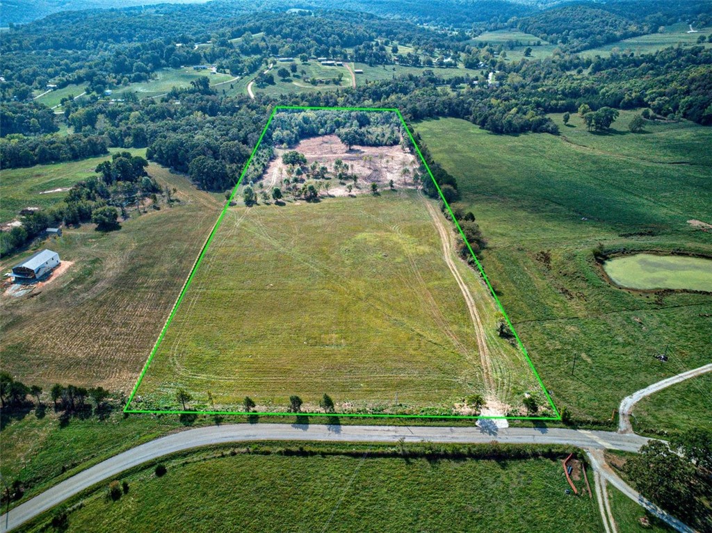 Looking for that acreage that has it all? Beautiful 17.5 acres, pasture and woods. Only 8 min to schools, 10 min to grocery store, and 20 min to Fayetteville. Plenty of pasture, some woods to hunt, level, views and more! Also rural water available, Ozark Go for internet, Black Hills Energy line crosses the property. Raise cows/horses, ride 4 wheelers, or just enjoy peace and quiet. Don't miss it! Agent Owned.
Also available nearby, 16+ acres, MLS# 1252804.