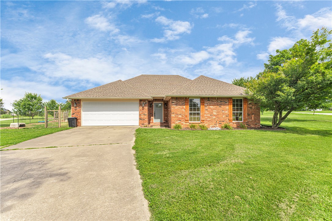 Welcome to this beautifully maintained brick home featuring 3 bedrooms and 2 full baths, thoughtfully designed with a split floor plan for added privacy and comfort. The eat-in kitchen offers a cozy and functional space, perfect for casual dining and family meals. Sitting on a flat, cleared corner lot, the outdoor space provides ample room for recreation, gardening, or simply enjoying the open yard. Whether you're hosting a backyard barbecue or relaxing in the fresh air, this property delivers both space and potential. Located just off Highway 412, youāll enjoy easy access to Huntsville, Fayetteville, and Springdale! This home has been thoughtfully updated with major systems already taken care of: a new roof and HVAC system were installed in 2021, along with a new hot water heater. The septic tank was pumped and the septic pump replaced in 2023, giving you added peace of mind. Please note: the chicken coop, refrigerator, washer, and dryer do not convey with the property. You donāt wanna miss this one!