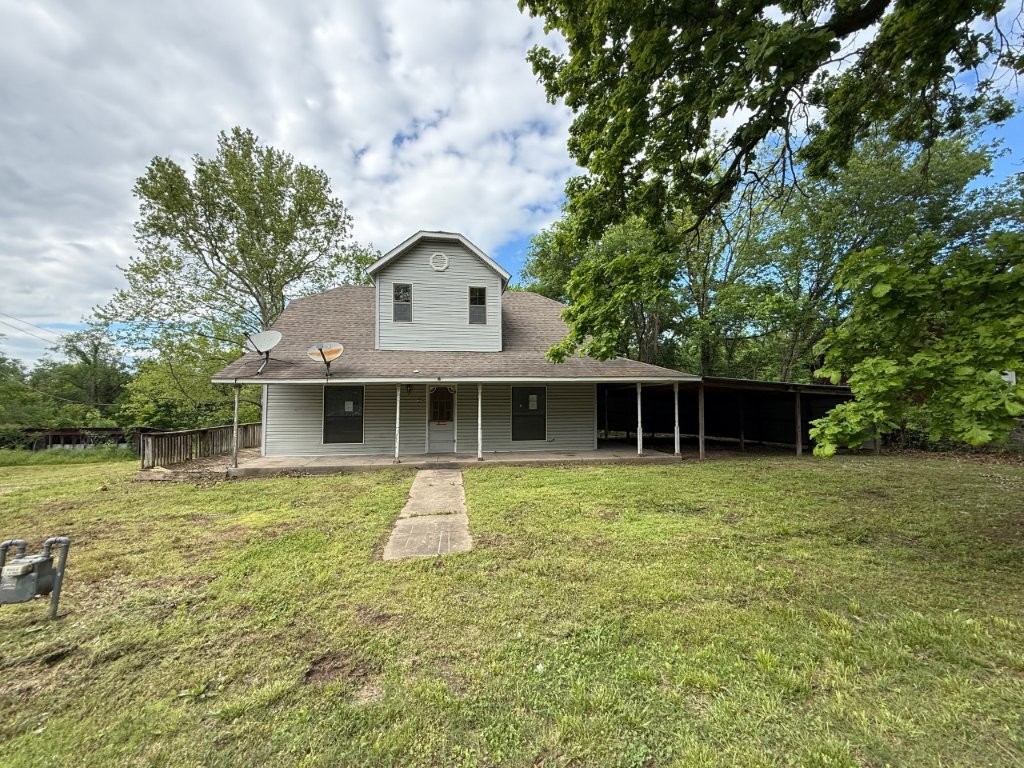 Historic Sulphur Springs, circa 1905 located on 4 lots at the corner of Flickinger and Duff with Butler Creek directly behind the property. Renovation needed to make this move in ready once again - great potential! If property was built prior to 1978, Lead Based Paint Potentially Exists. Sold AS-IS, no repairs.