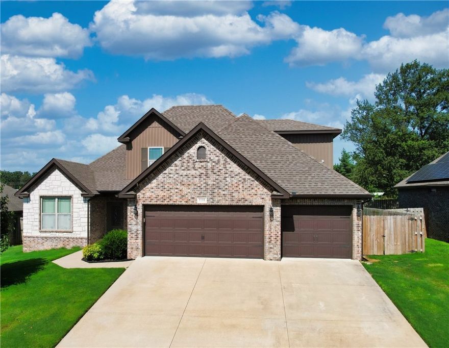 Move-in ready in a quiet Centerton subdivision! Freshly painted with wood-look tile in main living areas, LVP in bedrooms and new carpet upstairs. Spacious, open layout offers flexible living with plenty of natural light. The kitchen is centrally located with a gas cooktop, a new microwave & dishwasher, lots of storage & a pantry. The split floor plan on lower level has 3 of 5 bedrooms & 2 full bathrooms while the upstairs accommodates 2 bedrooms & a full bath. The primary suite is spacious and conveniently located off laundry room. The 3-car garage includes a walk-in storm shelter for added safety and drop zone/mudroom for as you walk inside. Enjoy the outdoors from the covered back patio overlooking a fully fenced yard with 2 cherry trees, a dogwood tree, a maple tree and a storage shed. Located just minutes from schools, parks,  & XNA national airport, and 7 miles from downtown Bentonville —this home combines comfort, convenience, and peace of mind in a prime location! NO HOA FEES! Ask for Feature Sheet.