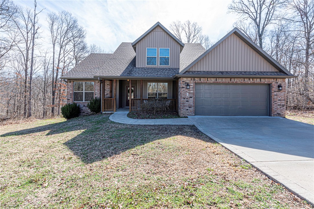 WELCOME HOME! This 3 bedrm 2.5 bathrm is near Branchwood Nature Trail & Tennis Courts, Loch Lomond Lake, I-49, & 20 min from Walmart Home office, & more! From the covered front porch head inside to the formal dining with large windows and crown molding. Relax in the spacious livingrm with 11' ceilings, fireplace, & lots of natural light! Enjoy the breakfast nook with built-in desk & L-shaped kitchen feat: white cabinetry, granite counters, stainless steel apps, counter height peninsula & pantry! Rejuvenate in the main-floor primary suite with vaulted ceiling & private bath feat: double sink vanity, jacuzzi tub, tiled shower, & walk-in closet! Upstairs - A large Bonus rm , two more bedrms, & 1 full bath! Laundry rm includes additional storage and folding counter! Head out back to the covered deck to watch for Arkansas wildlife while enjoying the privacy of your home! Bella Vista POA incl: private community amenities such as golf courses, lakes, hiking/biking trails, swimming pools, and more! Don't miss out! Act Now!