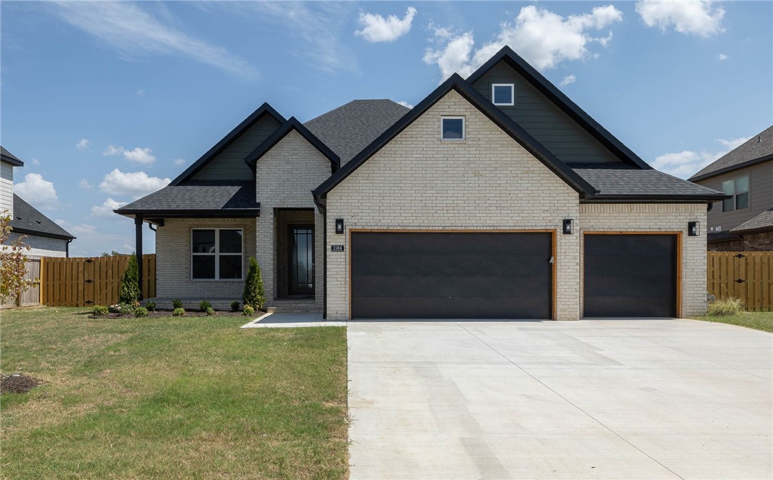 West Springdale NEW construction that is complete and MOVE IN READY!!! 2,663 heated and cooled sq ft offers an amazing floorplan with 4 bedrooms (of which 2 are on the main level), 3.5 bathrooms, oversized living open to kitchen, dining, mudd room, and separate laundry room. Other amenities include LVP floors, incredible amounts of built in cabinetry through out, walk in closets, pantry, gas cooktop, vaulted ceilings with wood beams, beautiful tile work, outdoor fireplace with a covered back patio, fully fenced in backyard, and 3 CAR GARAGE! Zoned for Har-ber School District.