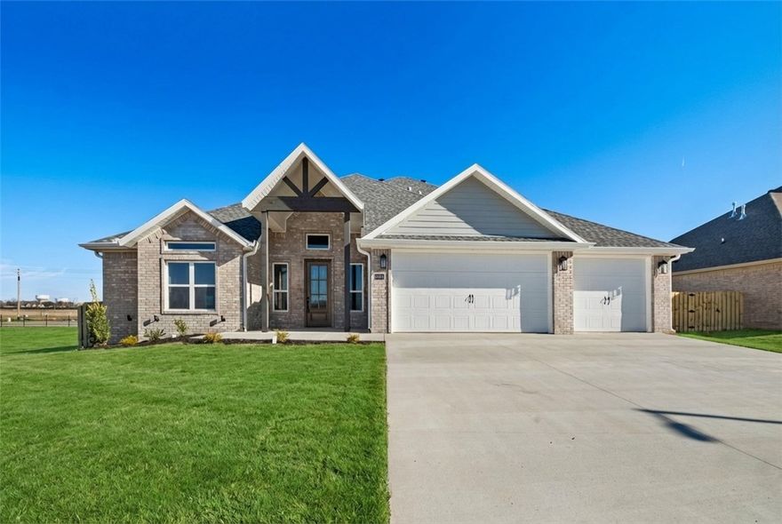 The Augusta Plan in Centerton! Stunning new construction with an open floor plan featuring 4 bedrooms and 3.5 bathrooms. Enjoy the large covered porch with outdoor fireplace, perfect for entertaining. The primary suite offers a tiled shower and spacious wrap-around closet. Upstairs includes 2 bedrooms, 1.5 baths, and a bonus room. Additional features: 3-car garage, gutters, blinds, and fenced yard. The house is still under construction and pictures are not of actual house but similar plan and finish. Taxes are based on land only. The builder is offering $7500 towards closing costs or rate buydown, plus fence, blinds, and gutters. Preferred lender incentives available.