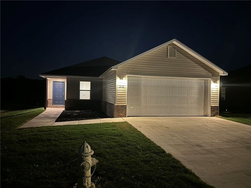 welcoming covered entryway and front yard landscaping. This one-story home features 4 bedrooms and 2 bathrooms. Enjoy the large open-concept living room, fully equipped kitchen with energy-efficient appliances, ample counterspace, and corner pantry. The laundry room, conveniently located just off the garage, is perfect for any sized family