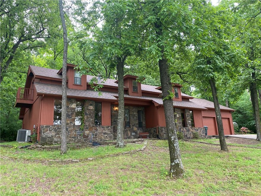Open floor plan 4 bedroom plus office or 5 bedroom 3.5 bath home for rent! Bedrooms are HUGE plus has a very large bonus room. Living room has corner rock fireplace with vaulted ceilings, built-ins and 3 window seats to enjoy the views. Other feature include 2 upstairs balconies, stairwells on each end of the house and tons of counter space. Master suite has rock fireplace and large jetted tub. HVAC just 2 years old. Large 1 acre wooded lot for your enjoyment!