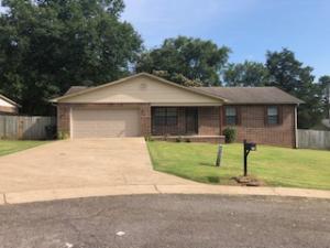You will think its new construction! Newly remodeled. Very nice 3 bedroom 2 full bath brick ranch with vinyl trim. Spacious formal dining area off open country kitchen that includes an eating bar. Laundry/utility room is unusually large with room for washer, dryer, freezer and then some. Decorative tile in dining area and baths. Whirlpool tub in master bath. Back yard is large enough to build a shop. 2 lots = .62 acres. Total privacy wood fencing with gates IN TOWN! Front porch, back deck. Also includes gutters with screens and architectural shingles. Double garage with auto opener.