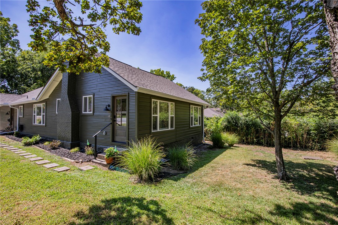 Step into a meticulously renovated 1900's home that seamlessly combines historic charm with modern luxury. From the brand-new roof to the updated HVAC, plumbing, and electrical systems, every detail of this residence has been carefully transformed. Admire the beautifully refinished wood floors that guide you through spacious rooms, each infused with a touch of its historical past. This exceptional home not only offers modern convenience but also pays homage to its rich history. Located in the heart of town with easy access to the trail system, parking is available on Johnson St. and in front of the home. You'll be within walking distance of Ozark Natural Foods, with peaceful strolls through the historical district and just minutes away from the University of Arkansas. Washer/dryer, fridge, internet, and lawn care are all included.