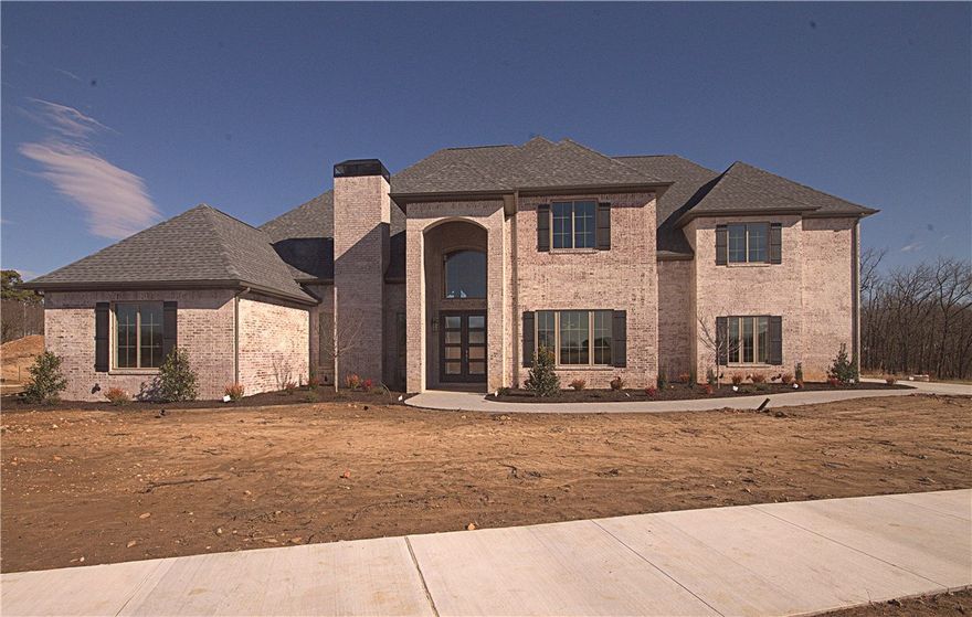 Payne Construction masterpiece... Estate home in the highly sought after gated community of Scissortail. 4 car garage, large bedrooms with walk-in closets, bonus room with wet bar and media room. Den with custom fireplace and formal dining room with easy access to the kitchen. Secondary bedroom on the main level with luxurious bathroom. All the features you want including home audio, central vac, Jenn Air appliances with a 6 burner cooktop, griddle and double ovens. Enjoy entertaining on the large covered back patio with built in grill and pergola.