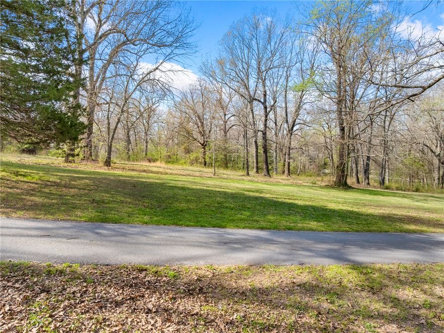 Beautiful 1.47-acre lot with beautiful trees and so much  potential. Located in Meriwether Pond inside Harrison city limits, this is Lot #4 in a quiet setting known for its natural beauty and spacious homesites. Gas, electricity, and water are available. An excellent opportunity to build a custom home in a peaceful setting.