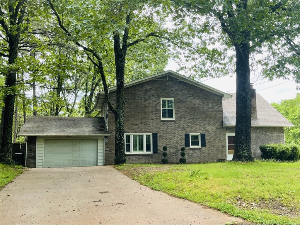 { First Buyer was unable to complete purchase contract. Home relisted after contract period expired.} This beautiful traditional style home has a huge open living area with freshly painted cathedral ceilings and features a bricked fireplace and big windows with wide wood shutters. The wrap around deck off the living room is perfect for grilling and outdoor living. The tiled kitchen is finished with light cabinetry and open to the large dining area. The large master bedroom and bath are conveniently located on the main floor. 2 large bedrooms and a big bath are on the upper floor. The walk out basement has an enormous family room with a fireplace and leads out to the private in ground swimming pool . The home sits on really large lots and back yard privacy. And downtown is just down the hill . So close to restaurants and shopping and all Eureka downtown has to offer.