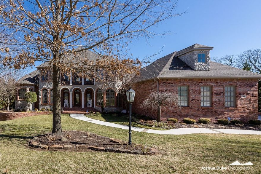 STUNNING TOTALLY UPDATED custom built three level estate nestled on a sprawling .89 acre lot in Candlewood on Fayetteville's East side. Main level features formal dining, spacious eat-in kitchen/hearth area w/fireplace, large living w/fireplace that walks out to deck, main level master retreat w/fireplace & deck access. The top floor hosts 2 gracious bedrooms each w/en suite baths, living area, and walk-in storage galore!! Amazing walk-out basement w/ full kitchen, wine closet, bonus room, great room w/dual sided fireplace, exercise room, bedroom, full bath, & craft room! Gorgeous backyard boasts an in-ground pool, natural stone firepit, 2 levels of connecting deck & covered patio space w/speakers, oversized pool deck, partially fenced yard all with a private treed view & all season running creek at property’s edge.  Other features include storage room & storm shelter, liquid granite garage floor, NEW roof & gutters in 2020, HVAC, central vac, house generator, Sonos system, Pozzi windows, and more!