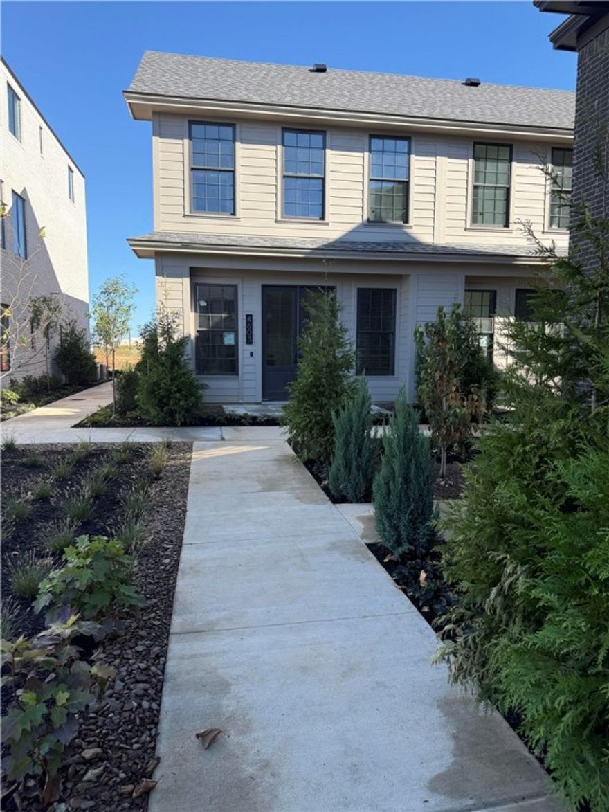 This stunning triplex is located in the heart of town, offering an unbeatable location and unbeatable luxury. This new development in Pinnacle Village is situated off of Pinnacle Hills Parkway behind the Walmart Neighborhood Market. Each unit features high-end finishes including hardwood floors, 10' ceilings, 8' interior doors, designer light fixtures & a Smart Thermostat. The open kitchen features quartz counter tops & high end stainless steel appliances with a gas range. This unit is also elevator ready for easy access to all levels. Spacious 2 car garage with an EV outlet. Additionally, the property is within walking distance to the Walmart Amp, Top Golf, the best restaurants, shopping, entertainment and so much more! Whether you are looking for a place to call your own or an investment property, this triplex offers the best of both worlds.