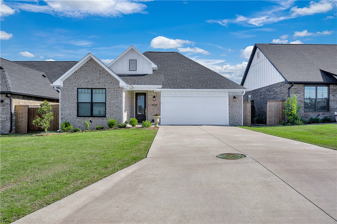 This beautiful home is located in the gated community of Pinnacle Parkāconveniently located near restaurants, city trails, & parks. Step inside to an open floor plan w/soaring ceilings that create a light, spacious feel throughout. Designed w/high-end finishes, this home offers a refined & modern living experience. The kitchen features a stunning white backsplash, leathered granite countertops, high-end appliances, and a generous pantry. Perfect for entertaining, the kitchen flows seamlessly into the open living & dining spaces. The primary suite is a true retreat, complete with a luxurious en-suite bathroom featuring a soaking tub, a beautifully tiled walk-in shower, & dual vanitiesāall finished w/ the same leathered granite found throughout the home. Guest bedrooms are equally inviting, sharing a bathroom w/matching high-end finishes. Additional highlights include a convenient drop zone that leads to a spacious laundry areaāoffering everyday functionality without sacrificing style.