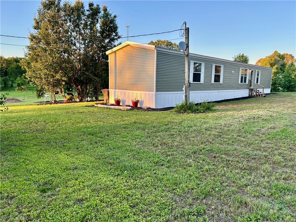 Charming One-Year-Old Mobile Home on 1/2 Acre Country Retreat
Immaculate and move-in ready! This beautifully maintained 1-year-old home sits on a serene and private 1/2 acre in the countryside, offering peace, privacy, and plenty of charm.
Step inside to discover a spotless interior filled with natural light and character. Outside, enjoy a huge back deck perfect for entertaining, relaxing, or soaking in the tranquil surroundings.
Whether you're looking for a quiet escape, a starter home, or a weekend retreat, this property offers the perfect blend of comfort, charm, and country living.
Don't miss this rare find-schedule your showing today!