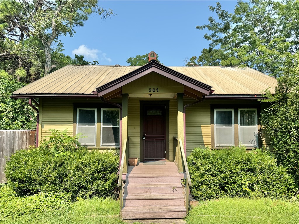 Welcome to 301 Fletcher Ave, Fayetteville, AR! Nestled in the heart of Fayetteville's historic district, this unique 2-bed, 1-bath house is available for rent. Brimming with charm, this home features a cozy primary living room and a versatile second living space, perfect for an office or den. Enjoy your mornings on the covered front porch and evenings on the back balcony, both ideal for relaxing and taking in the neighborhood's historic ambiance. This home has lots of windows and ample natural lighting. Nestled in a beautiful neighborhood, yet conveniently close to downtown Fayetteville, the University of Arkansas, shopping centers, restaurants, and parks, this house provides a wonderful blend of convenience and tranquility. Washer & dryer provided!
