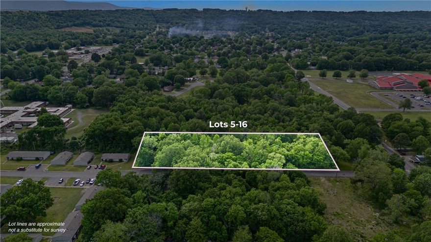 Wooded residential lots for sale on S. Independence in Russellville--Perfect for your future home or investment. Utilities are already at the road, making building easy. Don't miss this opportunity to own land in a peaceful, convenient location.
