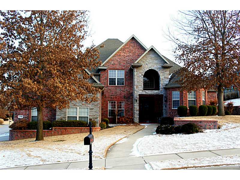 Beautiful home in The Manors with a backyard oasis with pool. The lush landspace layers around the home through raised beds and retaining walls with pathsways to lead you around. The back patio gives you tons of space to entertain and have fun.,Inside you will love how the home flows from formal to casual effortlessly with gleaming hardwoods, custom built-ins & a great kitchen. The master suite is isolated to it's own wing where you will find an office too. Upstairs is 3BRs, family rm + theater.