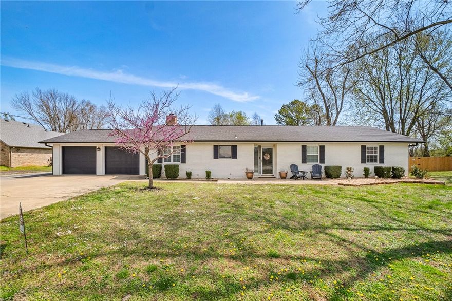 MOTIVATED SELLER! Endless opportunities for this 6 bdrm, 4.5 bath home w/ 3 living areas featuring two-level living, each floor having its own living area, kitchen, laundry, primary ensuite & secondary bdrms/office, all on 1 acre in the heart of Bentonville! Originally built in 1983, w/ addition on 2016 & recent kitchen remodel & other renovations make this home perfect for everyone w/ its two private entrances, large covered deck, mature trees, fully fenced backyard, covered BBQ area, 4 car garage plus 25x40 insulated heated/cooled shop w/ 12ft tall doors, great for RV/boat storage. Perfect for your next home, your home plus MIL suite, or investment opportunity. New HVAC in 2024.