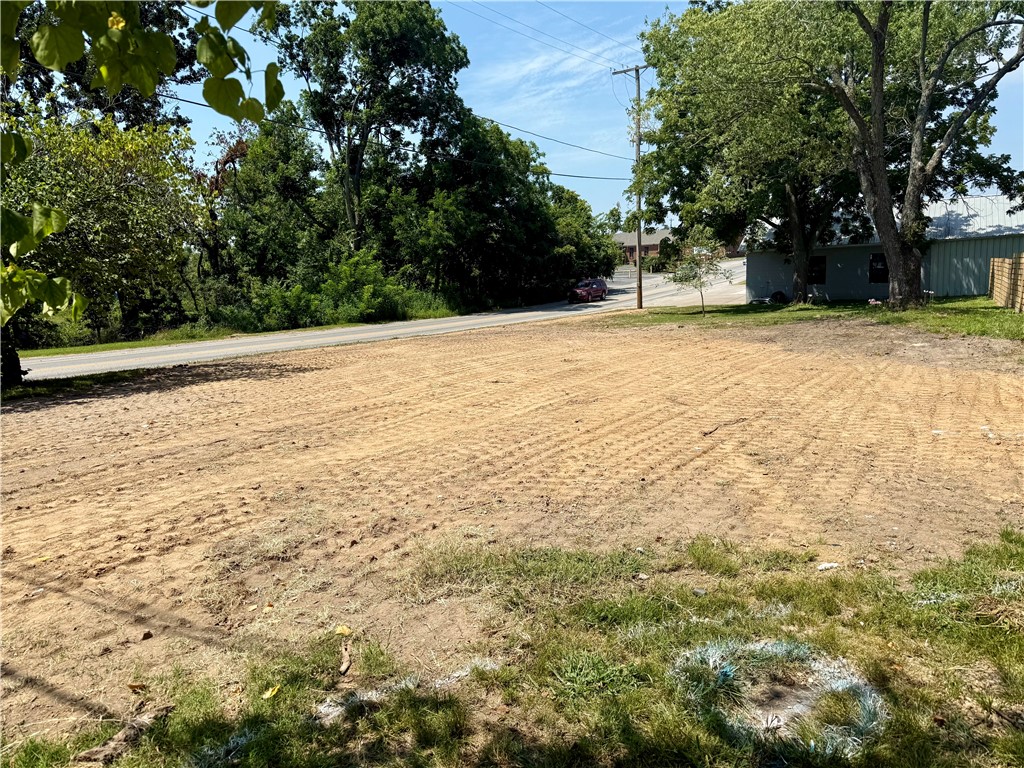 Seize a rare chance to develop in a high-demand Rogers corridor. This cleared lot with full utility infrastructure already in place offers prime AR Hwy 12 frontage and high-density mixed-use zoning with zero lot lines—giving you maximum flexibility for residential, commercial, or mixed-use builds. The location ensures excellent visibility, steady traffic, and proximity to the thriving downtown and surrounding developments. With site prep done and zoning that supports vertical density, this property is a ready-to-go project for those looking to capitalize on Rogers’ rapid growth. Property is zoned T4.2