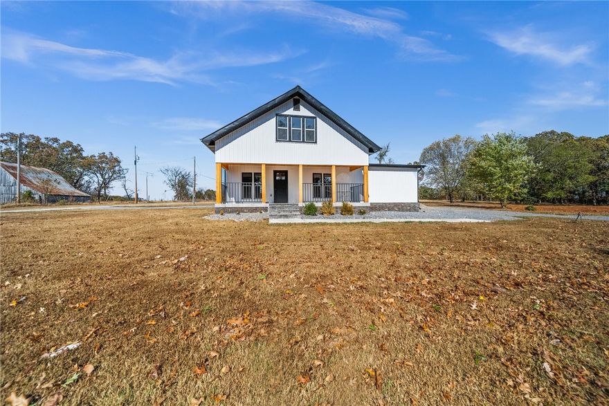 Welcome to your dream home! This beautiful totally remodeled 3 bed, 2.5 bath home is nestled on a serene 1 acre lot, offering the perfect blend of country living & modern convenience. As you approach, you'll be greeted by a stunning front porch. Inside the spacious open floor plan is bathed in natural light, showcasing a stylish kitchen complete with spacious pantry. The cozy living areas invite relaxation and gatherings with family & friends. The primary suite, features an en-suite bathroom the boasts contemporary finishes and ample storage. 2 additional bedrooms provide plenty of space for family & guests. Step outside to your expansive back porch, ideal for entertaining or simply enjoying the tranquility of nature. The property is landscaped. With a durable new metal roof and convenient 2 car carport, this is designed for ease of living. Located just minutes from Centerton, you'll enjoy the peace of country life without sacrificing convenience. Don't miss this rare opportunity to own a slice of paradise!