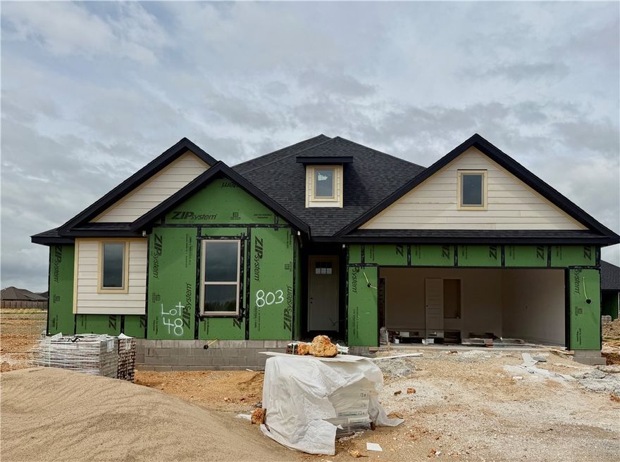 Located just off Highway 412, Bariloche offers quick access to major routes, making daily commutes and travel throughout Northwest Arkansas simple and convenient.The Mulberry floor plan features a layout that provides comfortable, functional space perfect for both everyday living and entertaining.Exterior features include full sod in both the front and back yards, creating an instantly lush look. A thoughtfully designed flower bed and front landscaping add beautiful curb appeal and charm.Inside, bathrooms are enhanced with framed mirrors for a touch of sophistication, along with cabinets installed above the toilets to provide stylish and practical storage.Residents also enjoy access to the community dog park with a walking path located at the back of the neighborhood. For a limited time, Lower your interest rate with $7,500 from the builder + $2,500 appliance allowance + up to 5k in closing costs from select lenders. For a total of up to 15K with lender incentives. Fence, blinds, and gutters are all included.