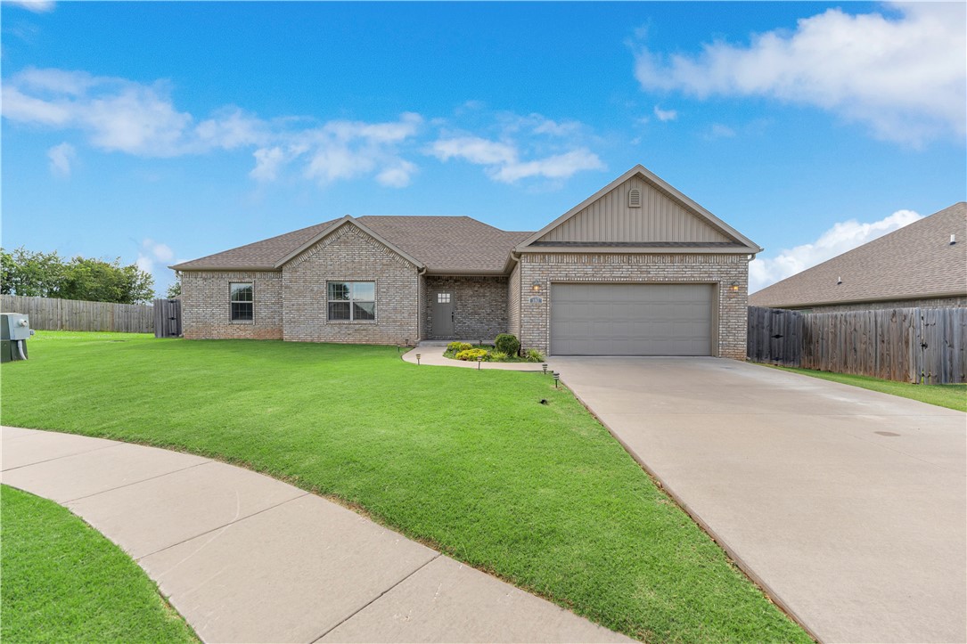 Located in the desirable Oak Creek subdivision, this is a beautifully maintained 4-bedroom, 2-bath, 1,852 sqft home. Built in 2020, it features modern finishes like granite countertops, gas cooktop, built-ins, and wood laminate flooring throughout the main living areas. The open-concept layout features a spacious living room with a gas-log fireplace and a kitchen equipped with stainless steel appliances and a large island—perfect for entertaining. The split floor plan provides privacy, and the primary suite includes dual vanities and a walk-in closet. Outside, relax under the covered patio in the fenced backyard. Situated near schools, shopping, and dining.