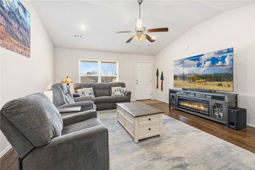 A new home for the new year! Enjoy this home within city limits only steps from shopping, amenities, and the highway providing convenient access to NWA, while also minutes from state parks, hiking, and kayaking opportunities. This immaculate and perfectly maintained home is waiting for you. This home has many upgrades that add to the comfort and beauty of the home. LVP throughout the main living area and the primary suite, high ceilings, and stainless steel appliances are just some of the features inside. When you enter the primary suite the large room and bathroom featuring garden tub and double vanity will transport you to a luxurious escape. The other 2 bedrooms and bathroom are spacious and functional. In the backyard you will find a large deck perfect for entertaining or enjoying the beautiful weather as well as a storage shed, matching the color and style of the home!