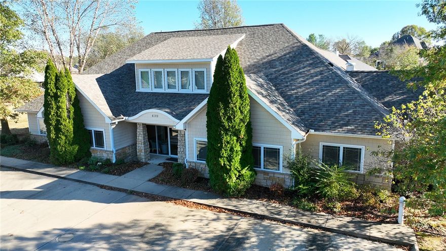 Beautiful two-story commercial office building for sale on the corner of E Mission Blvd and Carson Drive in Fayetteville, Arkansas. Includes spacious backyard, garage and abundant well-lit parking. Interior 
floor plan includes conference room, multiple offices, reception, restrooms, porch and kitchen. Surrounding the property are high-income residential neighborhoods with quick access to Historic Downtown Fayetteville and Interstate 49.