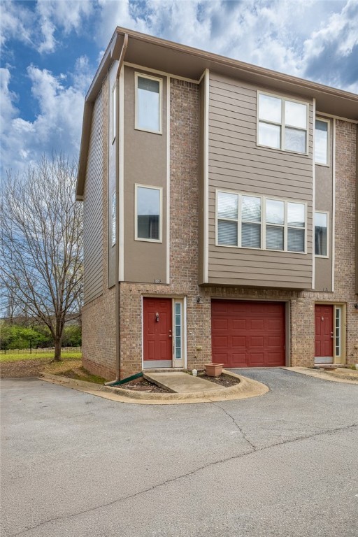 Welcome home to this beautifully maintained condo, just minutes from the University of Arkansas, Interstate 49, and everything Fayetteville has to offer! Step outside to direct access to the Razorback Greenway—perfect for morning walks or bike rides. Inside, you’ll find well-kept vinyl flooring installed just four years ago, updated appliances, and a spacious layout featuring 2.5 bathrooms and a private one-car garage.