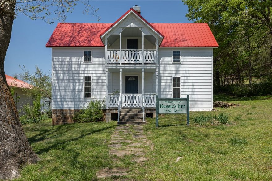 Bessie's Inn; where history and modern come together. Located just off the charming Huntsville square, this depression era homestead was stripped to its bare bones and given new life in 2020. In addition to fully rehabbing the existing structure, the floorplan was extended creating 2429 sqft. Serving as a short term rental, Bessie's Inn, comes TURNKEY & boasts 4 large bedrooms, 2 living rooms, a huge kitchen & 1 bathroom on each level. With ceramic wood floor tile downstairs and LVP up, there isn't an inch of carpet. The kitchen has like new stainless appliances and beautiful granite.The bathroom has a restored antique clawfoot soaker tub, tile shower & granite vanity. 2 large rooms and a living room round off the 1st level. Upstairs, you'll find 2 more large bedrooms, second living room/parlor & a full bathroom with tile shower and dual granite vanity. Red metal roof fits the motif with the 2-level covered porch and balcony. Walk to the boutiques on the square & Granny's for good eats. Cross-listed as MLS  1305202