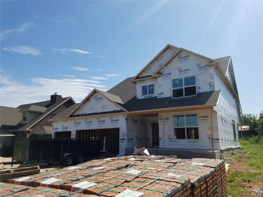 Quality New Construction Built by Riggins. This beautiful home boast 4 bedrooms, 3 baths, with bonus room, formal dining room, eat in kitchen, walk in pantry, master suit with walk in closet, double vanity sinks, hardwood flooring & SS appliances, Low E-Windows, Double French Doors off L.R. Gated community next to Bernice Young Elementary. Limited 1 Year Builders Warranty. Riggins Construction is the Award Winner of Parade of Homes 2014 Overall Buyers choice home builder & 2014 NWA Best of the Best