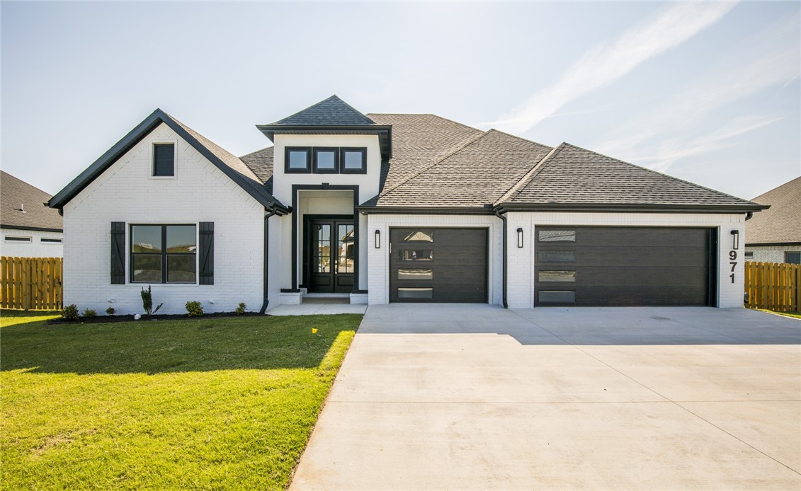*SOLD BEFORE PRINT* The summer is bringing some HEAT with this HOT new build in this NEW gated community! Open concept floorplan that is going to WOW you the moment you see it! Enjoy cooking on the chef gas stove & serving on the oversized island with quartz that compliments the custom cabinets. Farmhouse sink, double oven & built-in hidden microwave. Beautiful accents continue in the royal suite with quartz in all bathrooms, dual vanities w/ vanity area, free standing soaking tub, HUGE walk-in closet w/ drawers built-in, custom tile shower w/ dual shower heads. Statement upgraded fireplace, central vac, gutters, & so much more! The oversized back patio with a fireplace provides a perfect backyard for entertaining year around. Westridge Village has amazing amenities including a pool & playground. You're a short 0.6 miles North of Grimsley Junior High off of Vaughn Rd. Come TODAY to pick all of your final finishes to make it the perfect place to call home.