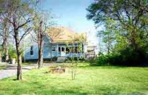 BEAUTIFUL VICTORIAN HOME SITTING ON TOWN HILL. UPSTAIRS FINISHED OUT WITH VARNISHED 1 X 6'S. ONE BIG OPEN ROOM, GREAT FOR BOY'S BEDROOM, ALSO WOULD BE GREAT FOR GAME ROOM. HIGH CEILINGS AND LARGE ROOMS. LOTS OF POTENTIAL.
