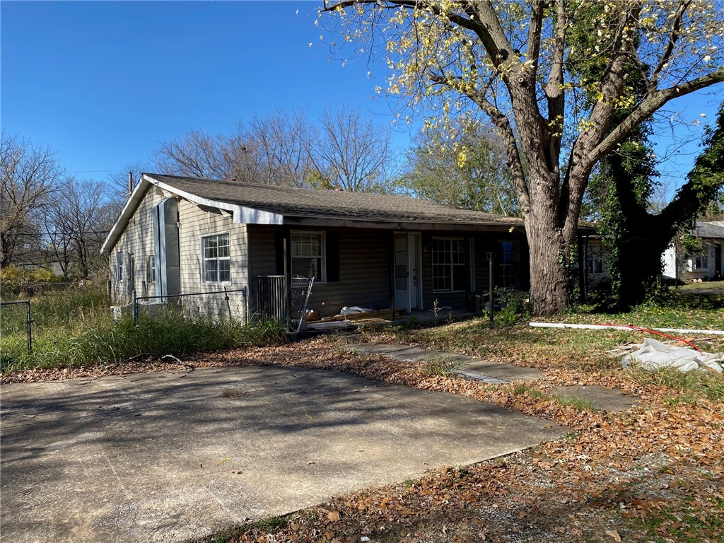 House is a "work in progress" with a complete renovation/remodel started. Completed so far, demo down to stud walls, new wiring, new roof, new plumbing. Foundation work completed and floors secured. Subfloor is still missing in areas and open, this will allow a buyer to inspect any work that has been completed and also understand what they will want to get done to completion. Property includes a separate buildable lot. So, can be just a large corner lot or possibly build a new home on the south lot.