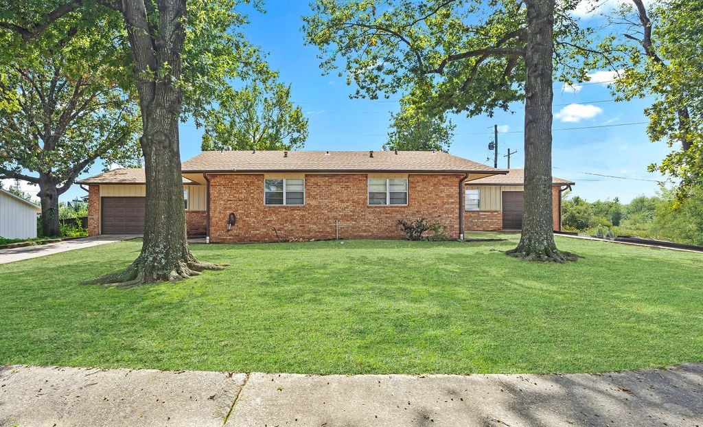 Adorable duplex located in the heart of Springdale! Each unit offers functionality boasting practical floorplan with open living space, eat-in kitchen and spacious bedrooms. Beautifully and professionally renovated throughout with modern upgrades including granite countertops, fresh paint, appliances, LVP flooring and fixtures. Over $120,000 in updates, and improved with new roof (August 2025). Both units have long term tenants with excellent gross cap rate of 9.3%. Each unit is rented for $1395. Situated conveniently close to all the amenities that NWA has to offer including shopping, dining and entertainment with easy access to I-49 and 71-B. Do not let this wonderful opportunity pass you by!
