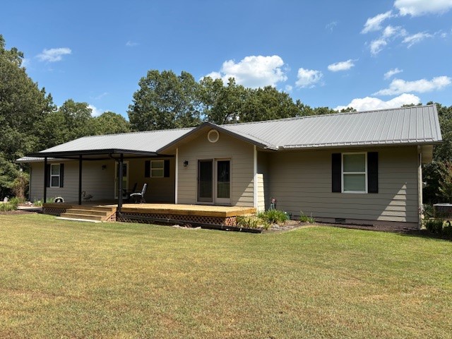 ONE LEVEL CUSTOM HOME ON 10 PRIVATE ACRES! This meticulously maintained, one owner custom built home offers over 1900 sq ft of comfortable living, all on one level. Located just minutes from the city limits off 65 North, this property offers the perfect blend of convenience and privacy. Setting at the end of the road on 10 acres, the home offers low maintenance metal roof, durable concrete siding, and a serene setting surrounded by nature. Inside you will find wood and tile floors throughout. This immaculate well maintained home showcases true pride of ownership. Whether you are looking for a peaceful retreat or a forever home with room to roam, this property checks all the boxes!