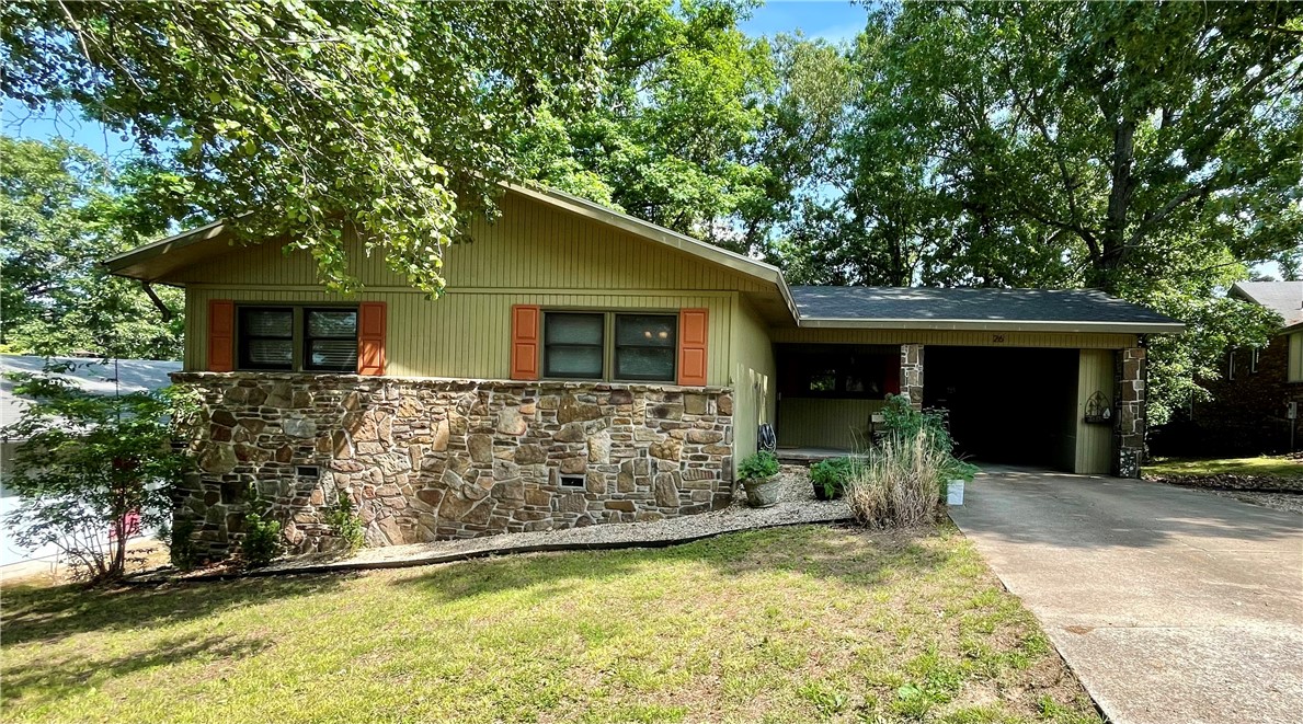 Nestled in a tranquil location, this home is a nature lover's paradise. Situated just .6 miles from the trails and 2.5 miles from the main road, it offers easy access while feeling remote. The serene wooded yard provides a peaceful ambiance, and from the back deck over 35 bird species have been spotted. Recently updated (3 years), the kitchen has a stylish remodel with butcher block counters, while the roof and deck are only 3 years old. Enjoy the abundance of natural light that filters through the brand-new windows in the living room. Stay comfortable year-round with the new AC unit installed in 2022. This idyllic haven promises a peaceful and quiet retreat with updates to give the new owner peace of mind. Per the previous owner, the septic was replaced in 2005. Check the virtual tour today and then see it in person!
