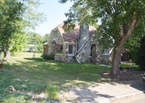 This is the one everyone's been looking for. Cedar lined closets, real hardwoods, gas fireplace that could be converted back to wood and that older home charm! Furnace and water heater have been updated as well as plumbing and wiring in most areas and can't forget about the new roof installed in 2017! 2 car detached garage all on a huge 110 x 207 foot chained link lots in the middle of town! With some updates this would be a real show piece!