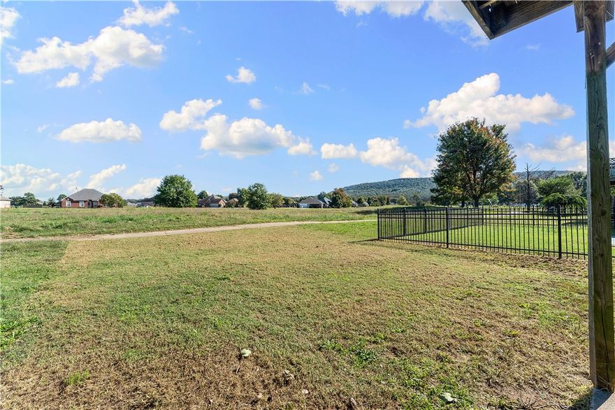 An exceptional opportunity for both first time homebuyers or discerning investors. A Condo that lives like a single family. Tucked away off a picturesque country road in Farmington, this charming condo offers affordable living among a single family home community giving it a truly exclusive feel.

Upstairs you’ll find 2 spacious bedrooms, 2 full bathrooms, plus a versatile loft, ideal for a home office or guest space. Each bedroom features its own full bath for ultimate privacy and convenience and the Primary bedroom offers balcony access. New Roof (2023) and no POA fees.

Just off the dining area, step onto the back porch for your bbq and onto a foot path spanning the backyard area. Prairie Grove schools yet all the amenities of Farmington shopping and just 7.5 miles to the UofA. The rare 2-car garage sets this condo apart—offering the storage and parking space you’d expect from a single-family home. A cozy gas fireplace ensures warmth, comfort, and the perfect touch of home. Floor plan available in Photos.