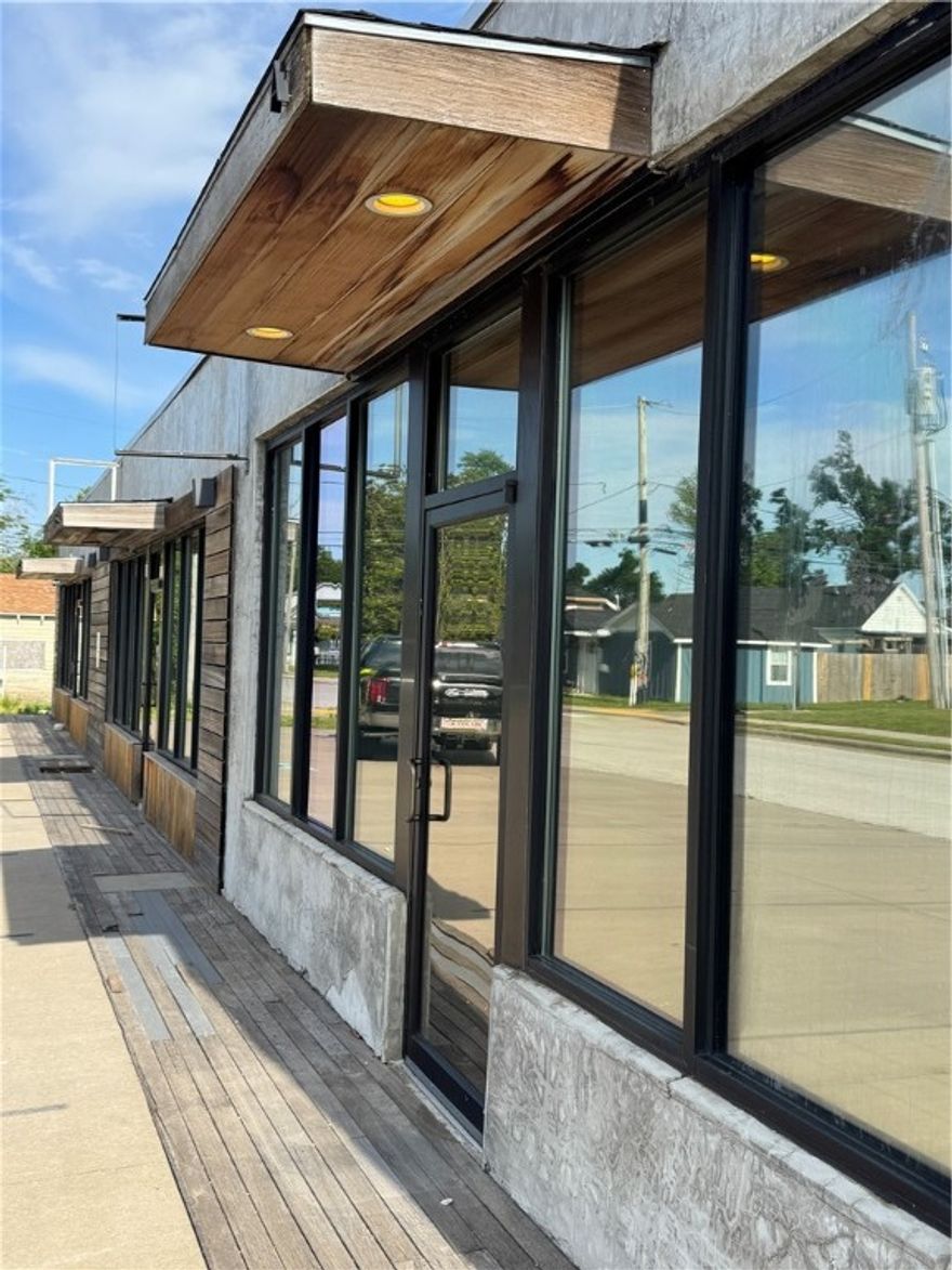 Great location. Three units with large warehouse space. Suite A is 48' deep x 24' wide with a person door and a garage door. 1/2 bath. Suite B 60' deep x 30' wide with kitchen, 1/2 bath. Suite C is 48' deep x 30' wide with full bath and electric water heater and kitchenette. Warehouse space is 85' deep x 26' wide with three garage doors.
