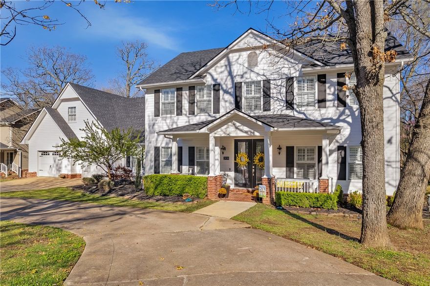 Spectacular Home with Fabulous Finishes throughout. Close to wonderful Schools, Shopping, biking and walking trails SUPER CLOSE easy access to I-49. Kitchen (Main level) updated with Granite, 2 dish drawer dishwashers, Built-in oven & mircowave, Gas cook top with vented down draft exhaust fan. Huge pantry and tons of storage. Home flows perfectly with 2 primary bedroom suites, newly updated walk in shower and soaking tub, owner's suite with sitting area w/ fireplace,  private balcony sunroom.  Home flows perfectly with amazing living spaces. Bonus room over garage has wall of closets & en-suite bath which can be 5th bdrm. Private backyard w/ gunite pool with lighted brick wall, separate large hot tub and beautiful mature trees. Fun Mancave Basement is heated and cooled with full bathroom with easy access to backyard & pool area. Safe place is also included here. The Basement is NOT included in the County Records or this MLS listing as Sq/ft. BE SURE to See the 
AMAZING 3-D Visual Tour with complete floor plan.