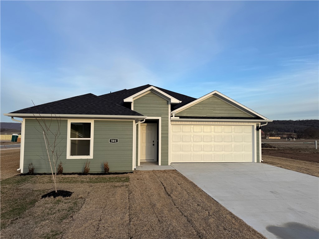Fabulous Fargo plan in Selah Meadows, our newest home community situated in the heart of Prairie Grove. Each home in Selah Meadows is meticulously crafted with attention to detail, creating a space that feels both luxurious and welcoming. From the moment you walk through the door, you'll be greeted by modern features and spacious layouts that cater to every lifestyle. Our homes boast premium finishes and thoughtful designs, ensuring that you'll be stepping inside your own personal oasis. These homes will be complete with LVP flooring throughout, wood shelving in all closets, pantry and utility room. Kitchen will have granite counters, 36-inch cabinets, stainless steel appliances! Ceiling fan in Living room and Bedroom One. Bedroom one bath will have granite kitchen counters, double sinks, and a walk-in shower. Home will have a Garage Door Opener, and a Landscape package. Home will have Beautiful 4 Sides Hardie Siding ®.