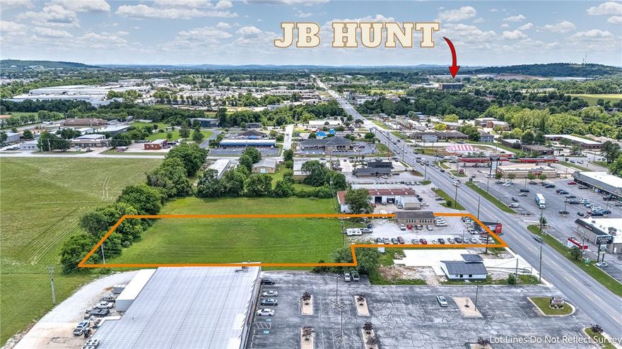 2.11 Acres with Road Frontage in Lowell, Zoned C-2 Thoroughfare Commercial. Fronting on the East side of N Bloomington St, just north of W Monroe Ave (Hwy 264). This is a prime investment opportunity, in an area of high growth and fronting on a major arterial North/South road. The cleared, level property and building is currently leased on a month-to-month basis to a used car lot. The tenant will be out before closing, if desired. All utilities are already onsite.